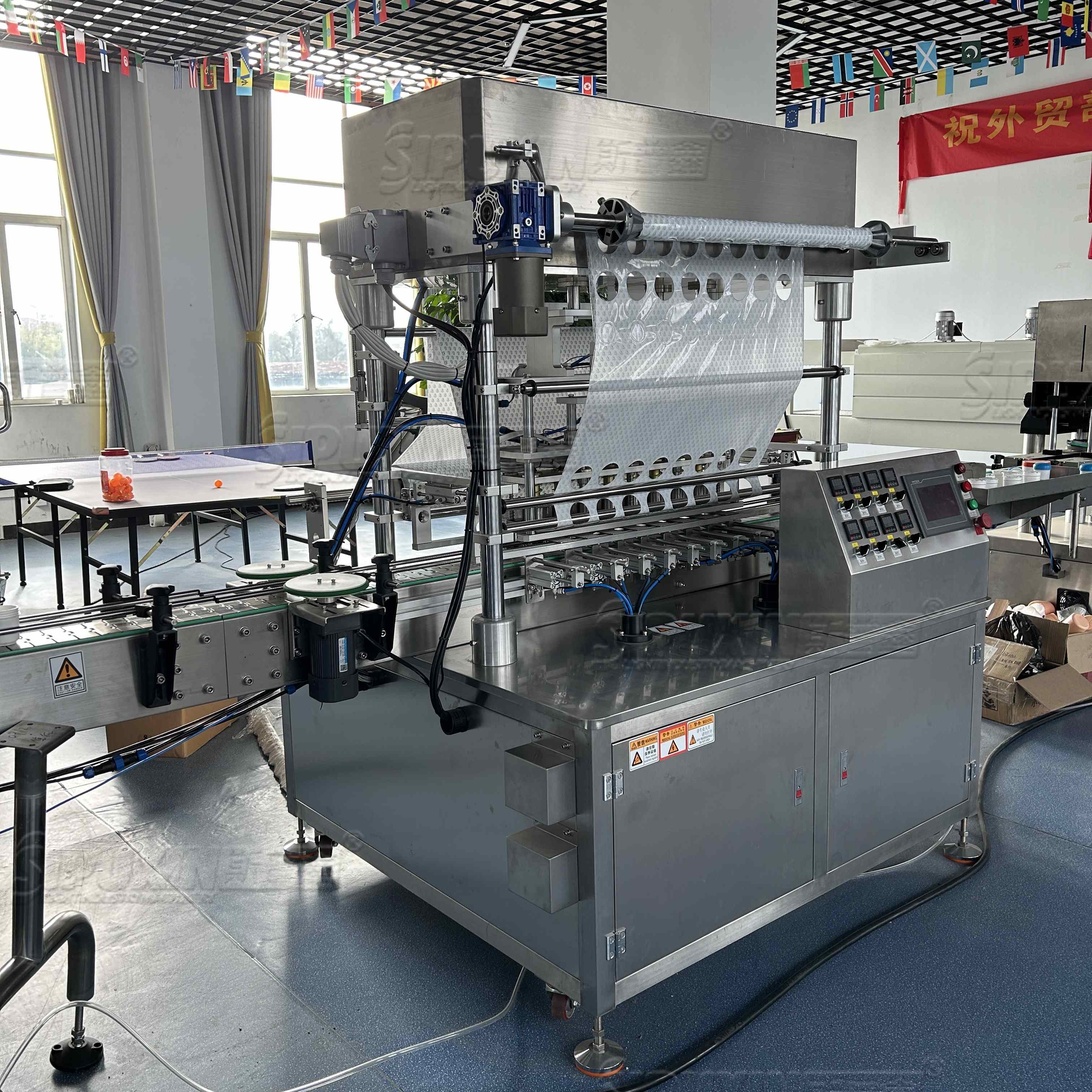 SPX 8-head Roll Film Sealing Machine for Beverage Etc Industry